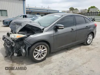 2015 Ford Focus SE with VIN 1FADP3F23FL338903, listed as a Copart auction lot 57149105 with 152,907 mi miles and Salvage title. Bid and sale history available at DreamBid. Image 1.