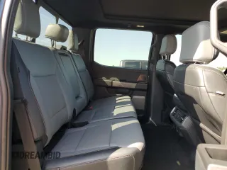 2023 Ford F-150 Lightning Pro с VIN 1FT6W1EV1PWG53186, выставлен на аукционе Copart как лот 52423485 с пробегом 23 518 миль миль и Списание • Salvage title. История ставок и продаж доступна на DreamBid. Изображение 10.