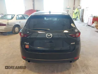 2018 Mazda CX-5 Touring with VIN JM3KFBCM9J0437490, listed as a IAAI auction lot 42006998 with 176,959 mi miles. Bid and sale history available at carsss.com. Image 16.