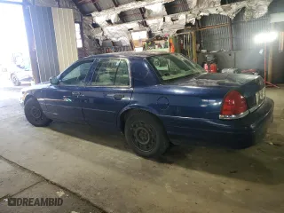 2004 Ford Crown Victoria Standard with VIN 2FAFP73W94X116602, listed as a Copart auction lot 84904824 with 89,214 mi miles and Salvage Title. Bid and sale history available at carsss.com. Image 2.