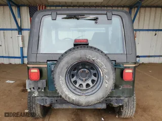 1995 Jeep Wrangler Sahara with VIN 1J4FY49S1SP256179, listed as a Copart auction lot 61137334 with 187,391 mi miles and Salvage Title. Bid and sale history available at carsss.com. Image 6.