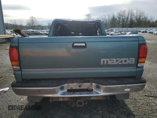 1994 Mazda B-Series Truck LE z VIN 4F4DR17X5RTN10704, wystawiony jako Copart lot #87230804 z przebiegiem 227 476 mil mil oraz Szkoda całkowita • Salvage title. Historia ofert i sprzedaży dostępna na DreamBid. Obrazek 6.