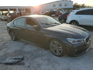 2018 BMW 7 Series 750i with VIN WBA7F0C5XJGM22674, listed as a Copart auction lot 74833524 with 0 mi miles and Salvage Title. Bid and sale history available at carsss.com. Image 4.