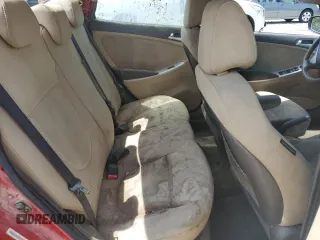 2013 Hyundai Accent GLS z VIN KMHCT4AE8DU441908, wystawiony jako Copart lot #53751375 z przebiegiem 146 721 mil mil oraz Szkoda całkowita • Salvage title. Historia ofert i sprzedaży dostępna na DreamBid. Obrazek 10.