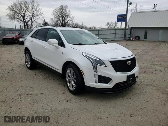 2021 Cadillac XT5 AWD Sport with VIN 1GYKNGRS5MZ142444, listed as a Copart auction lot 54502285 with 27,070 mi miles and Salvage title. Bid and sale history available at DreamBid. Image 15.