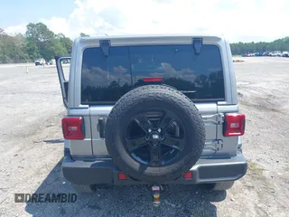 2021 Jeep Wrangler Unlimited Sahara with VIN 1C4HJXEN3MW628845, listed as a IAAI auction lot 42438049 with 49,970 mi miles and . Bid and sale history available at DreamBid. Image 16.