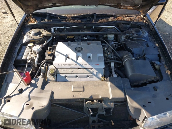 2001 Cadillac Eldorado Touring ETC z VIN 1G6ET12961B100627, wystawiony jako IAAI lot #41458966 z przebiegiem 113 620 mil mil oraz . Historia ofert i sprzedaży dostępna na DreamBid. Obrazek 10.