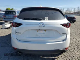 2021 Mazda CX-5 Sport with VIN JM3KFABM4M1321480, listed as a Copart auction lot 46187805 with 66,382 mi miles and Salvage Title. Bid and sale history available at carsss.com. Image 6.