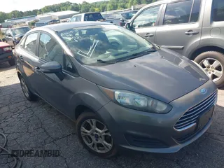 2014 Ford Fiesta SE z VIN 3FADP4BJ6EM186051, wystawiony jako IAAI lot #42309721 z przebiegiem 167 585 mil mil oraz . Historia ofert i sprzedaży dostępna na DreamBid. Obrazek 1.