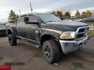 2010 Dodge Ram 2500 Laramie with VIN 3D7UT2CLXAG180004, listed as a Copart auction lot 85601834 with 165,763 mi miles and Salvage Title. Bid and sale history available at carsss.com. Image 4.