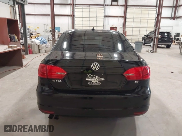 2014 Volkswagen Jetta SE with VIN 3VWD17AJ7EM409189, listed as a IAAI auction lot 42313804 with 139,950 mi miles and . Bid and sale history available at DreamBid. Image 16.