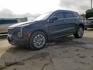 2024 Cadillac XT4 FWD Premium Luxury with VIN 1GYFZCR49RF248341, listed as a Copart auction lot 58586035 with 12,490 mi miles and Salvage title. Bid and sale history available at DreamBid. Image 1.