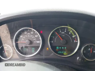 2012 Jeep Wrangler Sport z VIN 1C4AJWAG5CL171961, wystawiony jako IAAI lot #42590232 z przebiegiem 126 372 mil mil oraz . Historia ofert i sprzedaży dostępna na DreamBid. Obrazek 7.