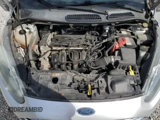 2016 Ford Fiesta SE z VIN 3FADP4BJ3GM142298, wystawiony jako Copart lot #54320835 z przebiegiem 144 636 mil mil oraz Szkoda całkowita • Salvage title. Historia ofert i sprzedaży dostępna na DreamBid. Obrazek 11.