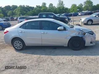 2018 Toyota Corolla L with VIN 2T1BURHE6JC100175, listed as a IAAI auction lot 42405737 with 123,183 mi miles and . Bid and sale history available at DreamBid. Image 13.