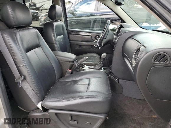 2006 GMC Envoy SLE with VIN 1GKDT13S462228967, listed as a Copart auction lot 73669484 with 233,349 mi miles and Salvage Title. Bid and sale history available at DreamBid. Image 7.