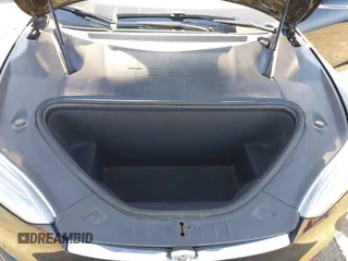 2020 Tesla Model S Long Range with VIN 5YJSA1E23LF381872, listed as a IAAI auction lot 41763046 with 96,720 mi miles and . Bid and sale history available at DreamBid. Image 10.
