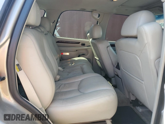 2003 Cadillac Escalade z VIN 1GYEC63T83R157632, wystawiony jako Copart lot #54950564 z przebiegiem 88 527 mil mil oraz Szkoda całkowita • Salvage title. Historia ofert i sprzedaży dostępna na DreamBid. Obrazek 11.