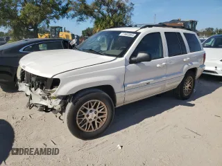 2002 Jeep Grand Cherokee Limited with VIN 1J4GX58S32C320843, listed as a Copart auction lot 77663864 with 289,537 mi miles and Salvage Title. Bid and sale history available at DreamBid. Image 1.