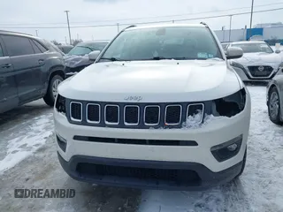 2019 Jeep Compass Latitude with VIN 3C4NJDBB0KT813014, listed as a IAAI auction lot 41560221 with 63,307 mi miles. Bid and sale history available at carsss.com. Image 12.