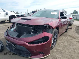 2021 Dodge Charger GT with VIN 2C3CDXHG2MH647775, listed as a IAAI auction lot 41697313 with 51,298 mi miles and . Bid and sale history available at DreamBid. Image 2.