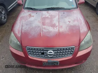 2006 Nissan Altima 2.5 with VIN 1N4AL11D96N401521, listed as a IAAI auction lot 41451401 with 233,591 mi miles. Bid and sale history available at carsss.com. Image 6.