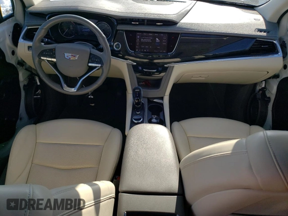 2022 Cadillac XT6 Premium Luxury with VIN 1GYKPCRS0NZ173802, listed as a Copart auction lot 87419534 with 28,373 mi miles and Salvage Title. Bid and sale history available at carsss.com. Image 8.