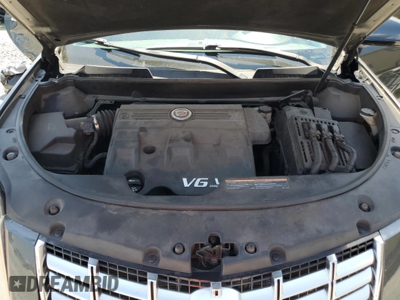 2016 Cadillac SRX Luxury Collection z VIN 3GYFNBE38GS567063, wystawiony jako Copart lot #57216775 z przebiegiem 95 413 mil mil oraz Szkoda całkowita • Salvage title. Historia ofert i sprzedaży dostępna na DreamBid. Obrazek 12.