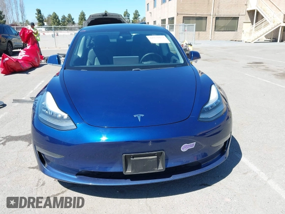 2019 Tesla Model 3 Mid Range with VIN 5YJ3E1EA0KF425079, listed as a IAAI auction lot 41871022 with 61,684 mi miles and . Bid and sale history available at DreamBid. Image 12.