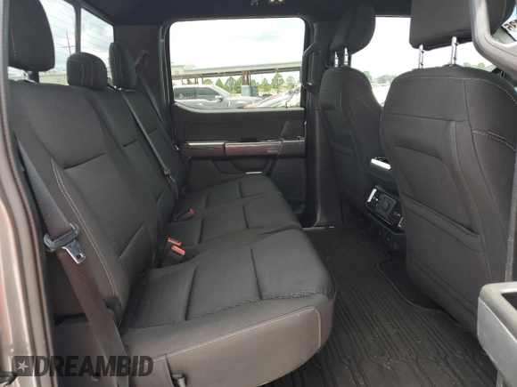 2021 Ford F-150 XL with VIN 1FTFW1E87MFC00633, listed as a Copart auction lot 65318235 with 91,264 mi miles and Salvage title. Bid and sale history available at DreamBid. Image 10.