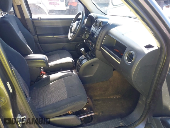 2014 Jeep Patriot Sport with VIN 1C4NJPBA5ED842849, listed as a IAAI auction lot 42530106 with 270,570 mi miles and . Bid and sale history available at DreamBid. Image 5.