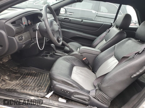 2004 Chrysler Sebring GTC z VIN 1C3EL75R54N391270, wystawiony jako Copart lot #47597475 z przebiegiem 172 810 mil mil oraz Czysty tytuł • Clean title. Historia ofert i sprzedaży dostępna na DreamBid. Obrazek 7.