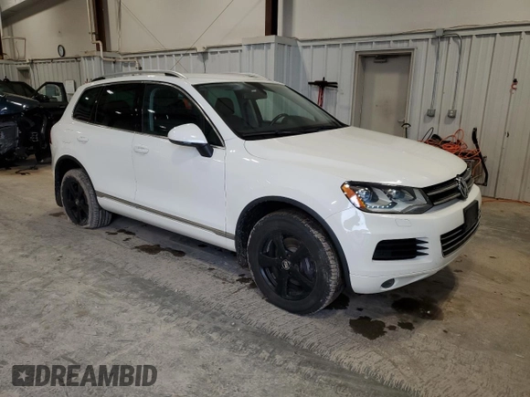 2012 Volkswagen Touareg Sport with VIN WVGFK9BP3CD002756, listed as a Copart auction lot 53378665 with 149,918 mi miles and Clean title. Bid and sale history available at DreamBid. Image 4.