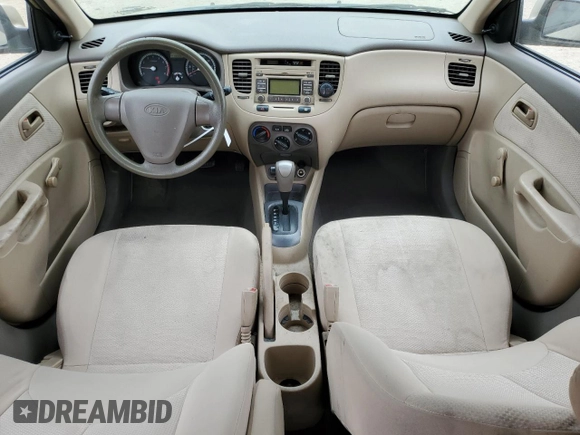 2009 Kia Rio LX with VIN KNADE223496549097, listed as a Copart auction lot 54375975 with 140,882 mi miles and Salvage Title. Bid and sale history available at DreamBid. Image 8.