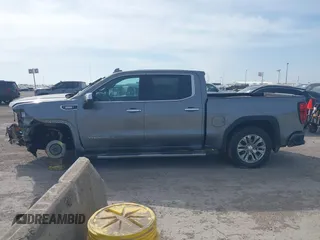 2021 GMC Sierra 1500 Denali z VIN 3GTU9FETXMG382438, wystawiony jako IAAI lot #41880365 z przebiegiem 54 651 mil mil oraz . Historia ofert i sprzedaży dostępna na DreamBid. Obrazek 15.