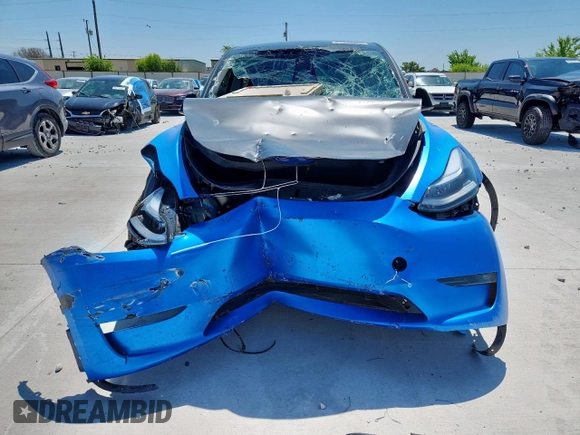 2024 Tesla Model Y Long Range z VIN 7SAYGDEE3RA238059, wystawiony jako Copart lot #61395925 z przebiegiem 14 991 mil mil oraz Szkoda całkowita • Salvage title. Historia ofert i sprzedaży dostępna na DreamBid. Obrazek 5.