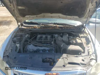 2011 Ford Taurus SEL z VIN 1FAHP2EW2BG176510, wystawiony jako Copart lot #51081085 z przebiegiem 261 031 mil mil oraz Szkoda całkowita • Salvage title. Historia ofert i sprzedaży dostępna na DreamBid. Obrazek 11.