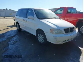 2005 Kia Sedona LX with VIN KNDUP132956703200, listed as a IAAI auction lot 41700159 with 125,578 mi miles. Bid and sale history available at carsss.com. Image 1.