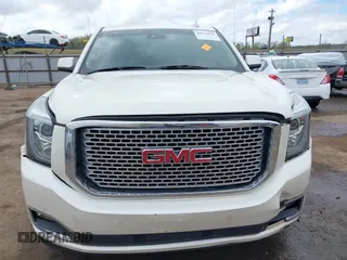 2015 GMC Yukon Denali with VIN 1GKS2CKJ7FR737165, listed as a IAAI auction lot 41914478 with 156,059 mi miles. Bid and sale history available at carsss.com. Image 6.