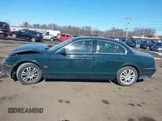 2005 Jaguar S-Type with VIN SAJWA01T95FN51551, listed as a IAAI auction lot 41637854 with 90,075 mi miles and . Bid and sale history available at DreamBid. Image 14.