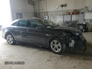 2015 Ford Taurus SEL with VIN 1FAHP2E83FG162476, listed as a Copart auction lot 50307345 with 74,663 mi miles and Clean title. Bid and sale history available at DreamBid. Image 4.