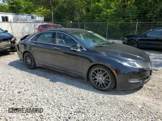 2015 Lincoln MKZ с VIN 3LN6L2JKXFR615351, выставлен на аукционе Copart как лот 64656985 с пробегом 100 515 миль миль и Списание • Salvage title. История ставок и продаж доступна на DreamBid. Изображение 4.