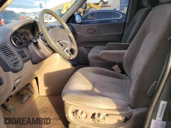 2003 Kia Sedona LX with VIN KNDUP131636359281, listed as a Copart auction lot 81978154 with 180,813 mi miles and Salvage Title. Bid and sale history available at carsss.com. Image 7.