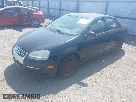 2008 Volkswagen Jetta Sedan S with VIN 3VWJM71K28M056528, listed as a IAAI auction lot 42007781 with 151,547 mi miles. Bid and sale history available at carsss.com. Image 2.