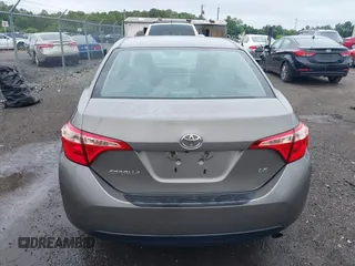 2018 Toyota Corolla L with VIN 2T1BURHE9JC990834, listed as a IAAI auction lot 42583027 with 217,143 mi miles and . Bid and sale history available at DreamBid. Image 16.