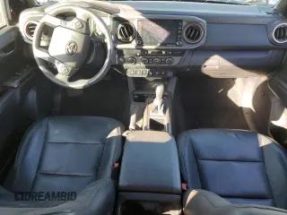 2023 Toyota Tacoma SR with VIN 3TMCZ5AN0PM538974, listed as a Copart auction lot 89165095 with 31,281 mi miles and Salvage title. Bid and sale history available at DreamBid. Image 8.