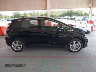 2023 Chevrolet Bolt EV 1LT z VIN 1G1FW6S0XP4150010, wystawiony jako IAAI lot #42256426 z przebiegiem 26 397 mil mil oraz . Historia ofert i sprzedaży dostępna na DreamBid. Obrazek 14.