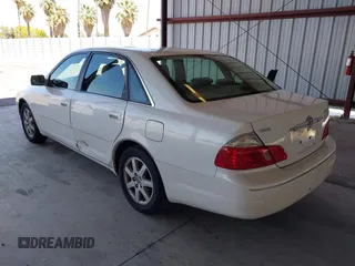 2003 Toyota Avalon XL z VIN 4T1BF28B03U307816, wystawiony jako IAAI lot #42313586 z przebiegiem 199 393 mil mil oraz . Historia ofert i sprzedaży dostępna na DreamBid. Obrazek 3.