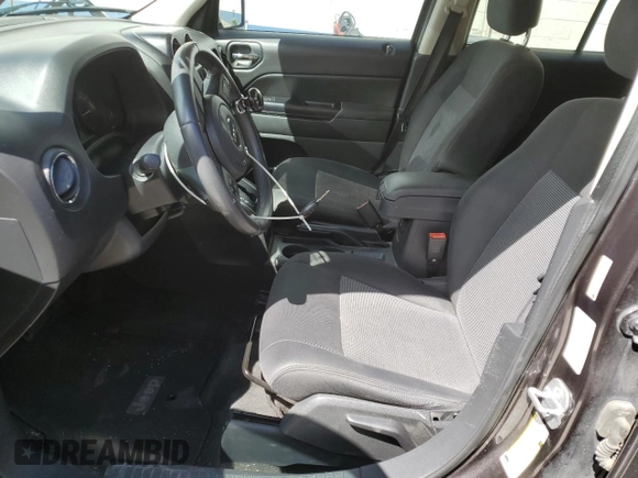 2014 Jeep Patriot Latitude with VIN 1C4NJRFB1ED727017, listed as a Copart auction lot 61660885 with 151,097 mi miles and Salvage title. Bid and sale history available at DreamBid. Image 7.