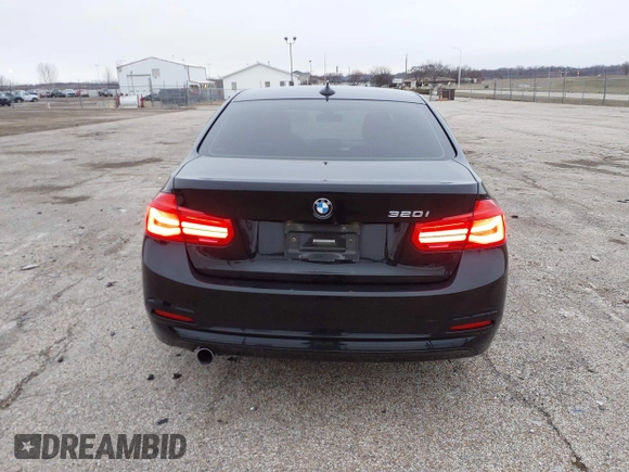 2018 BMW 3 Series 320i with VIN WBA8E1G56JNU91008, listed as a IAAI auction lot 41247490 with 57,434 mi miles. Bid and sale history available at carsss.com. Image 16.
